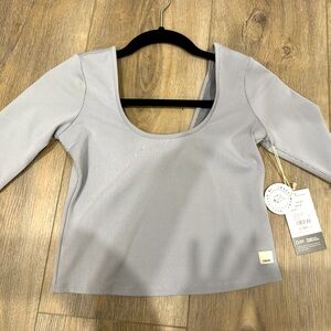 Vuori lux rib avant top- pale grey heather color , size small